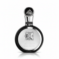 Silk and Sillage Lattafa Fakhar 100ML perfume bottle with ornate gold and black design on a decorative background.