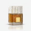 Silk and Sillage Lattafa Khamrah 100ml perfume bottle with a sleek, elegant design and gold accents.