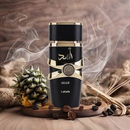 Silk and Sillage Lattafa Asad 100ml perfume bottle, alternate angle showing black and gold design.