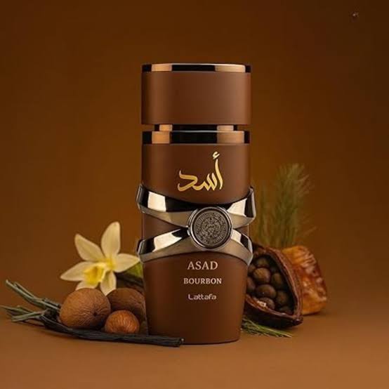 Silk and Sillage Lattafa Asad Bourbon 100ml perfume bottle, alternate angle showing brown and bronze design.