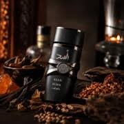 Silk and Sillage Lattafa Asad Elixir 100ml perfume bottle, alternate angle showing black and gold design.